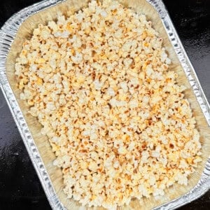 popcorn on the blakcstone griddle in foil pan.