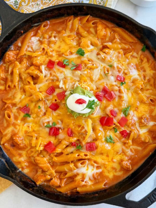 chicken enchilada pasta in a cast iron skillet.
