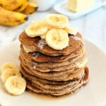 stack of banana cinnamon pancakes on plate.