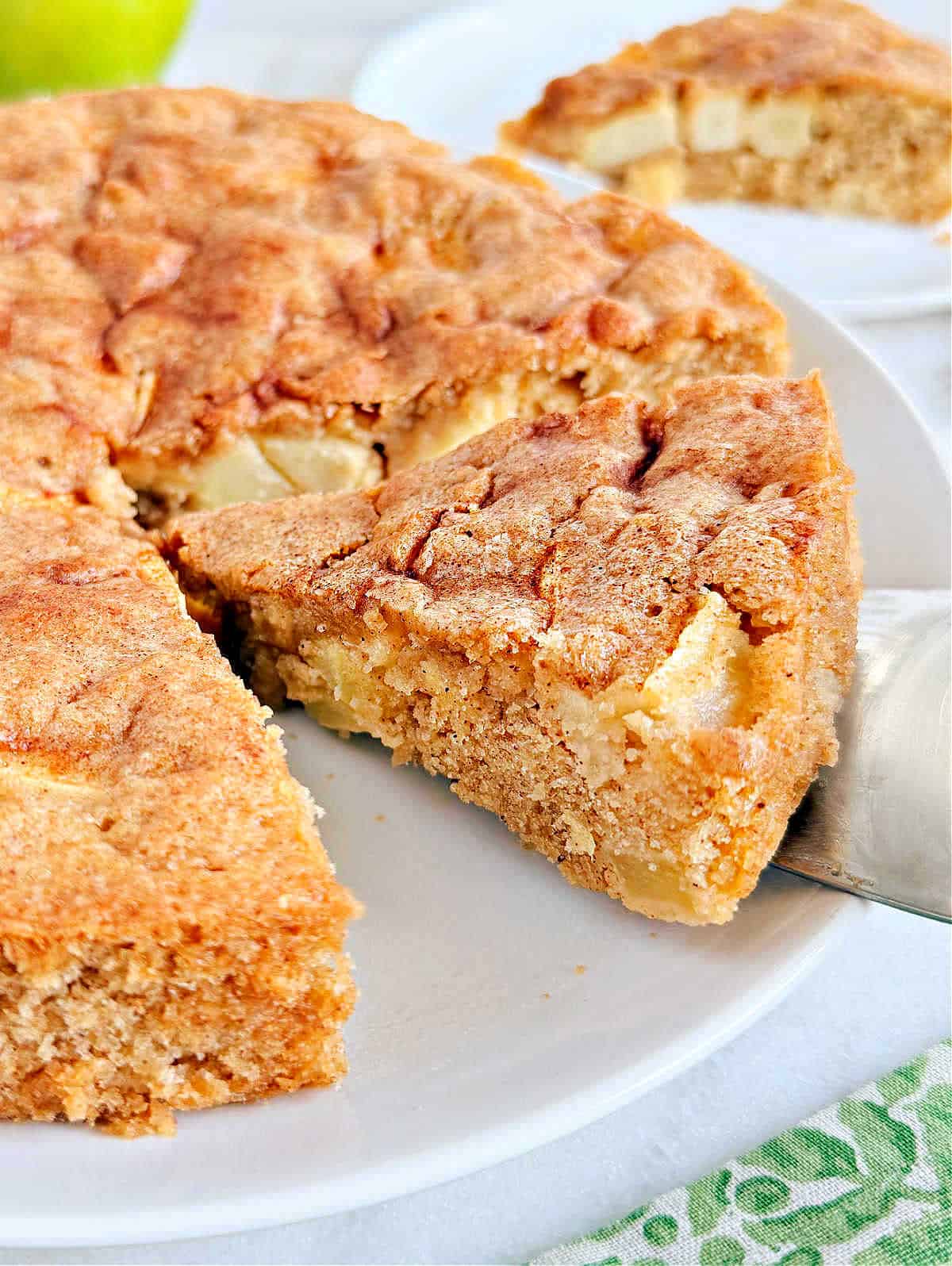 fresh apple cake slice on plate.
