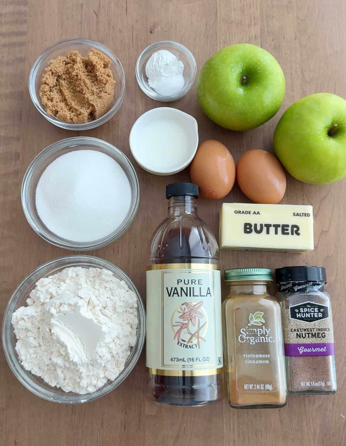 green apples and ingredients for cake.