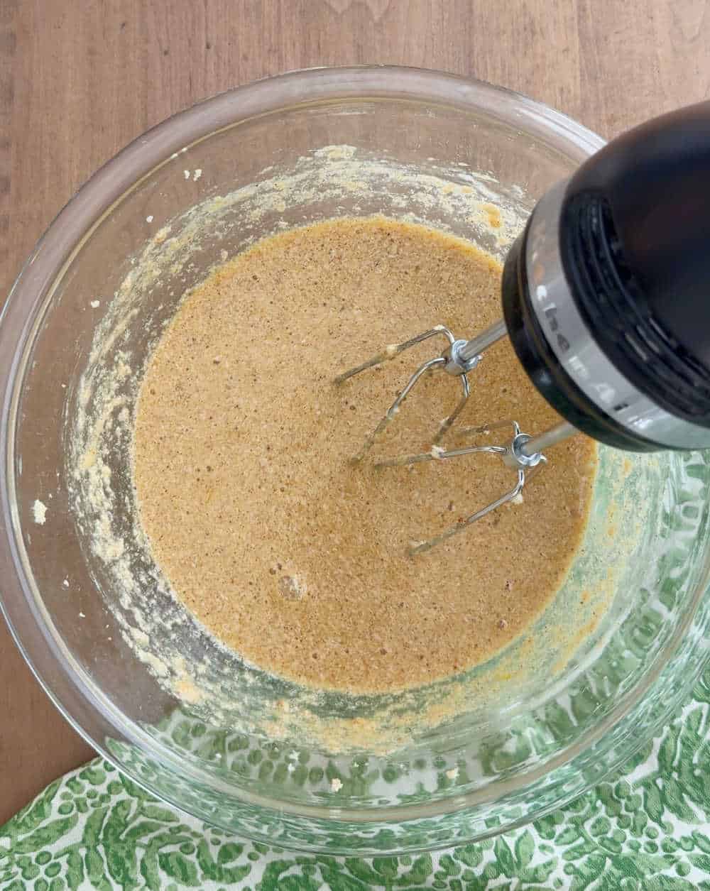 mixing wet ingredients in bowl.