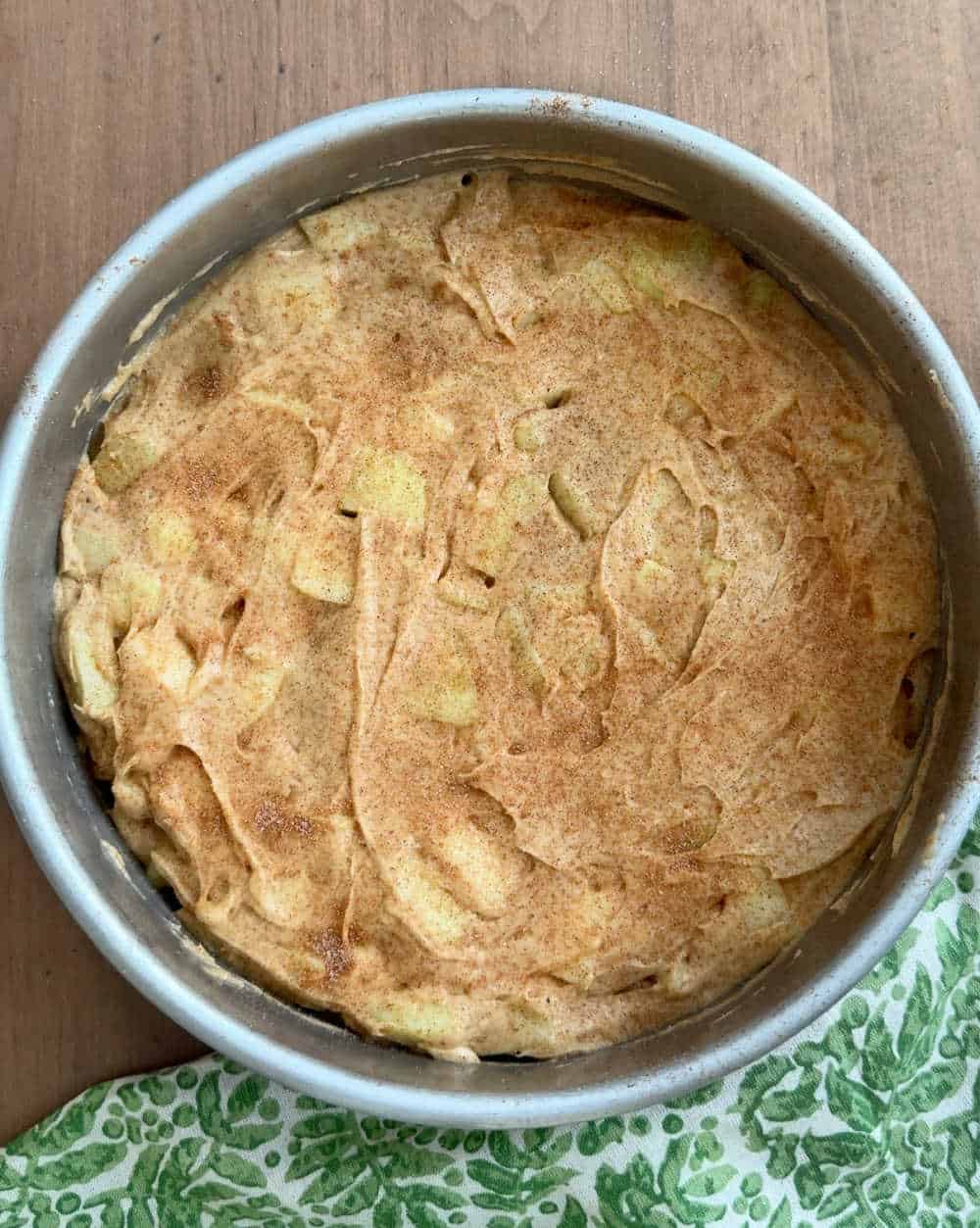 cake batter in round cake pan.