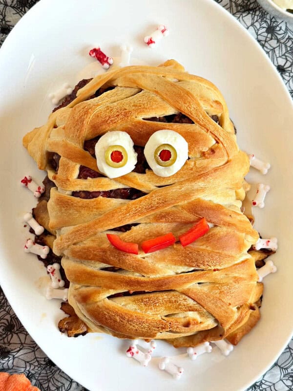 halloween meatloaf mummy on platter.
