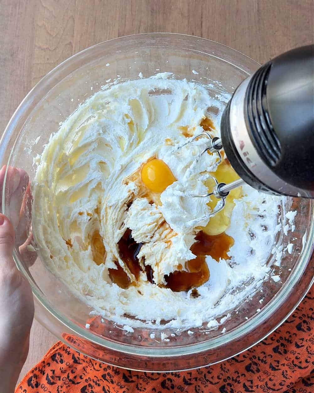 mixing wet ingredients in bowl.