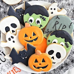 shaped halloween sugar cookies on plate.