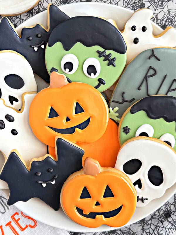 shaped halloween sugar cookies on plate.