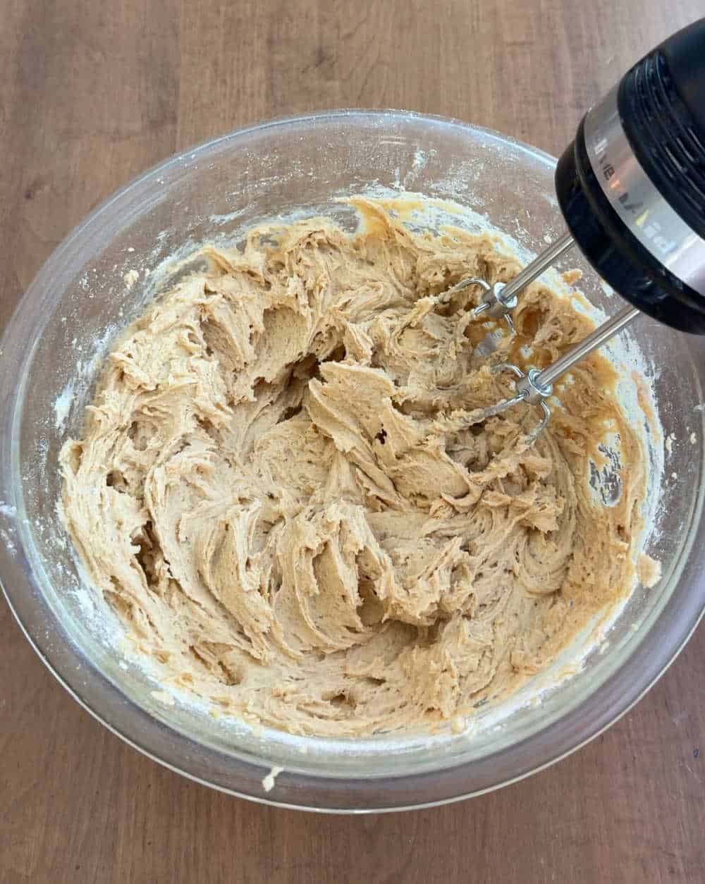 creaming wet and dry ingredients in bowl.