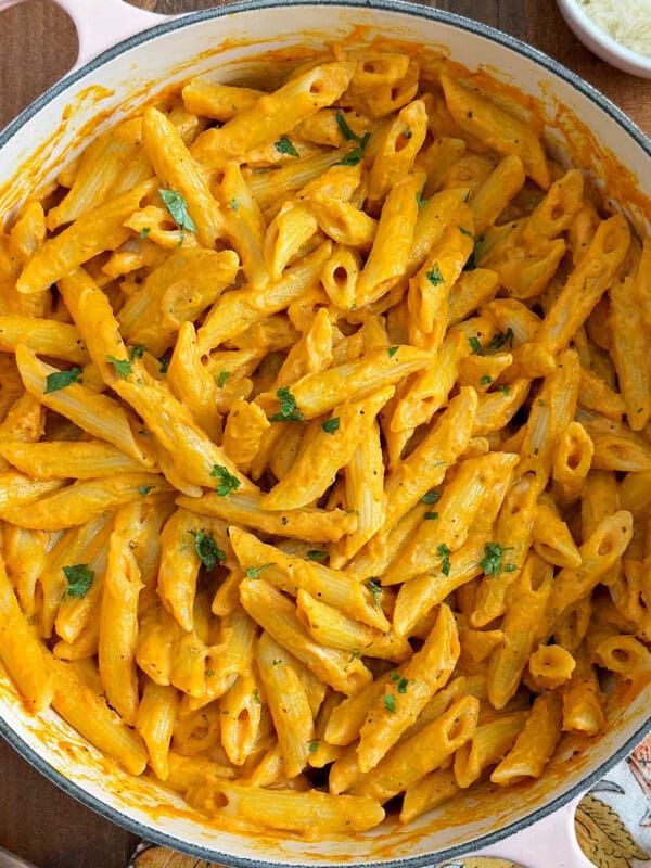 penne with pumpkin pasta sauce in Dutch oven.