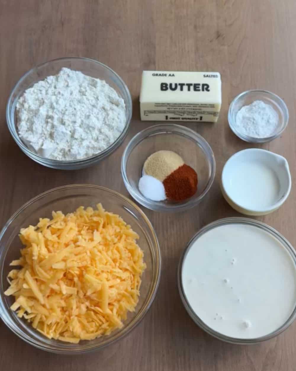 sourdough discard, butter, flour, cheddar cheese, baking powder,milk, spices.