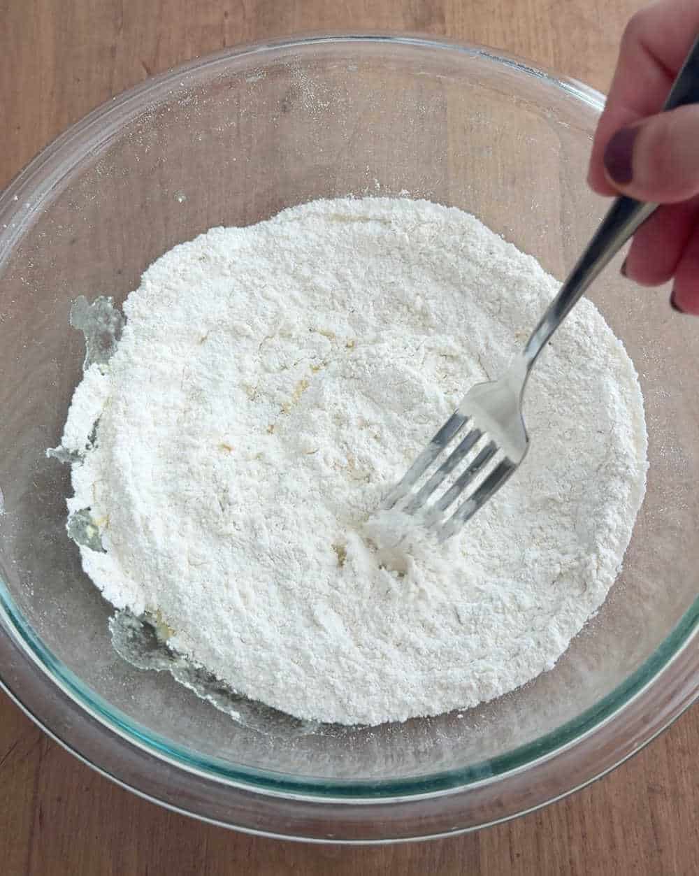 mixing dry ingredients with fork.