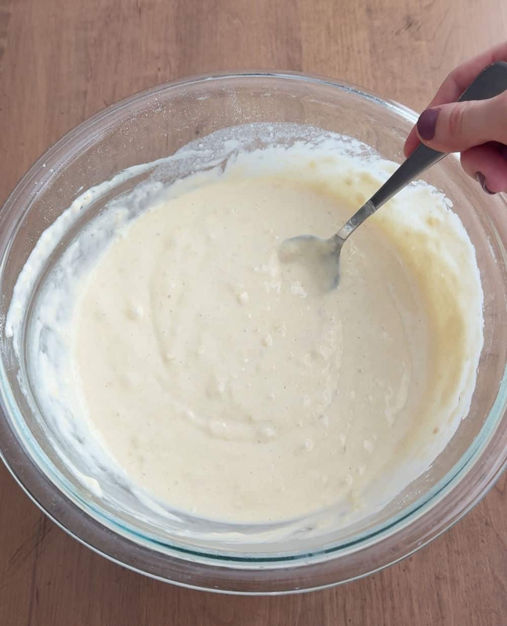 mixing pancake batter in large bowl.