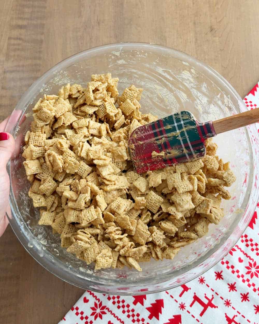 stirring in cereal with spatula.