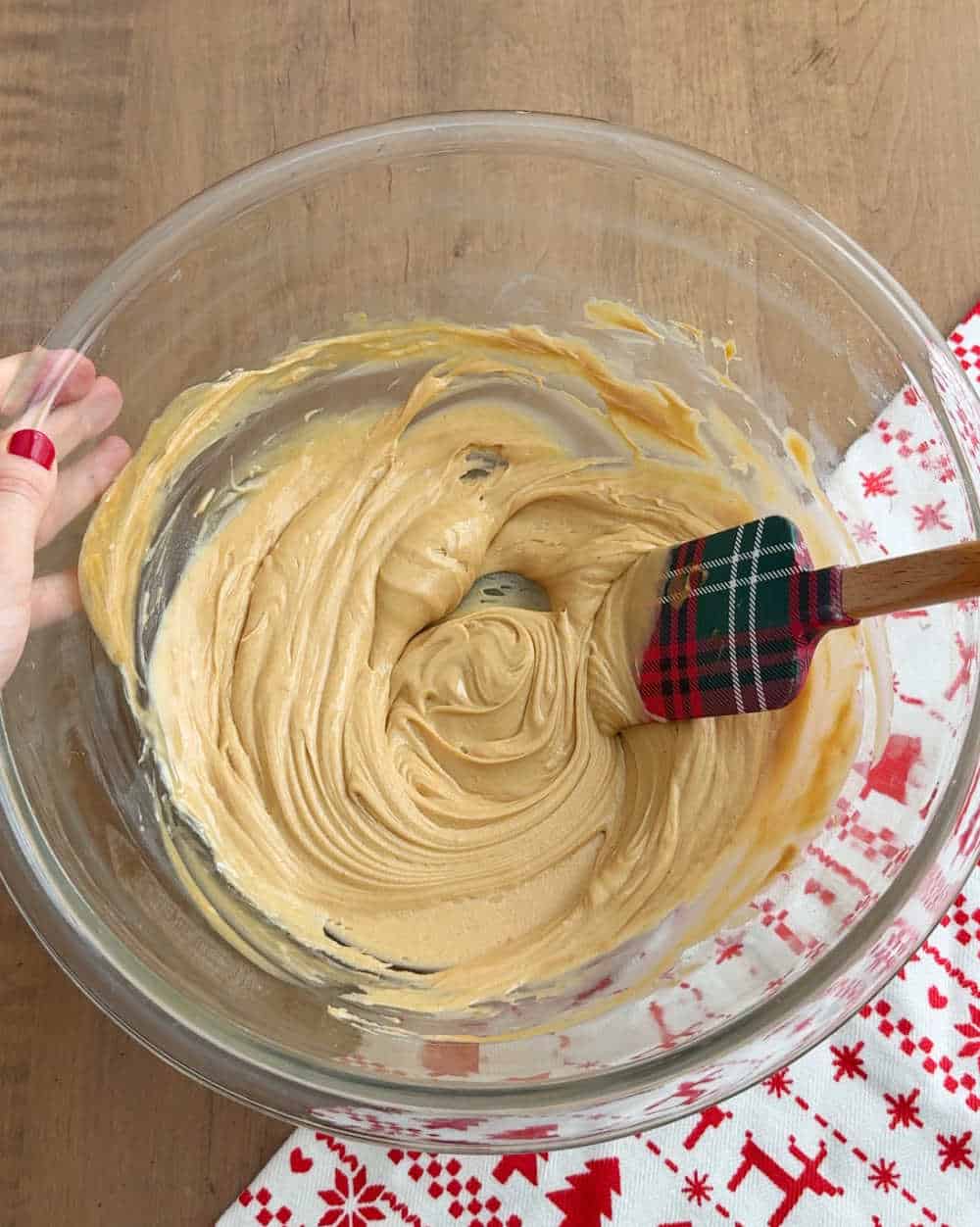 mixing peanut butter mixture in bowl.