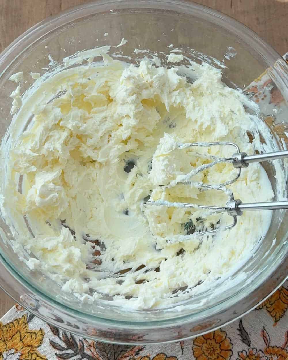 whipping cream cheese in bowl.
