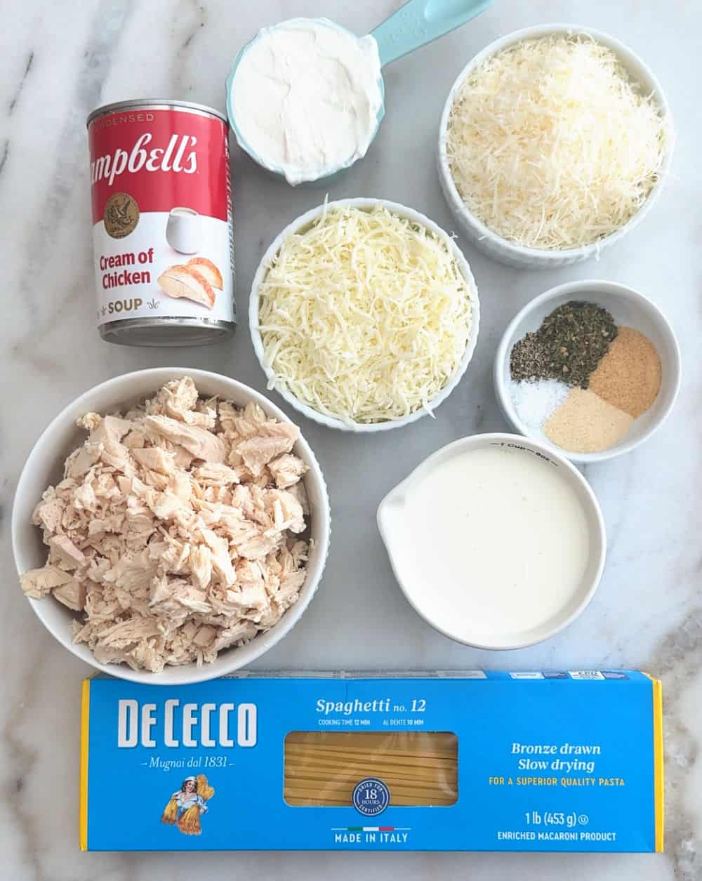 cooked turkey, spaghetti, cream soup, cream, sour cream, spices, cheese.