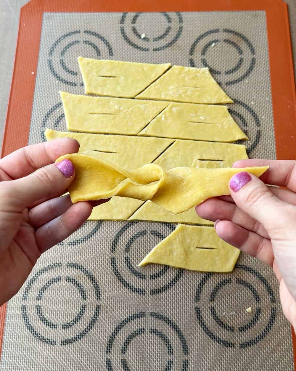 shaping chrusciki into wings.