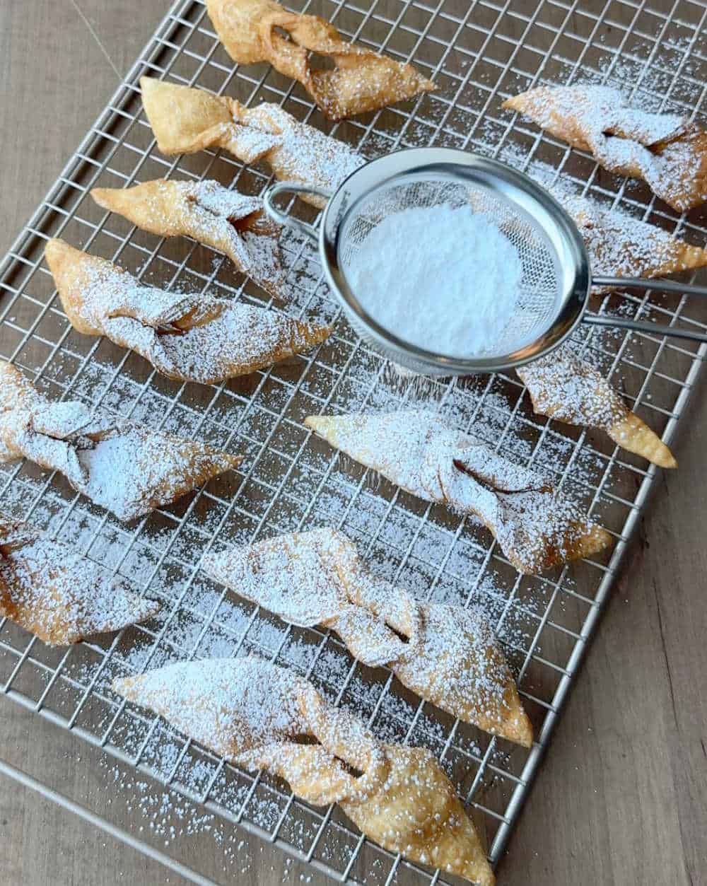 dusting cookies with powdered sugar.