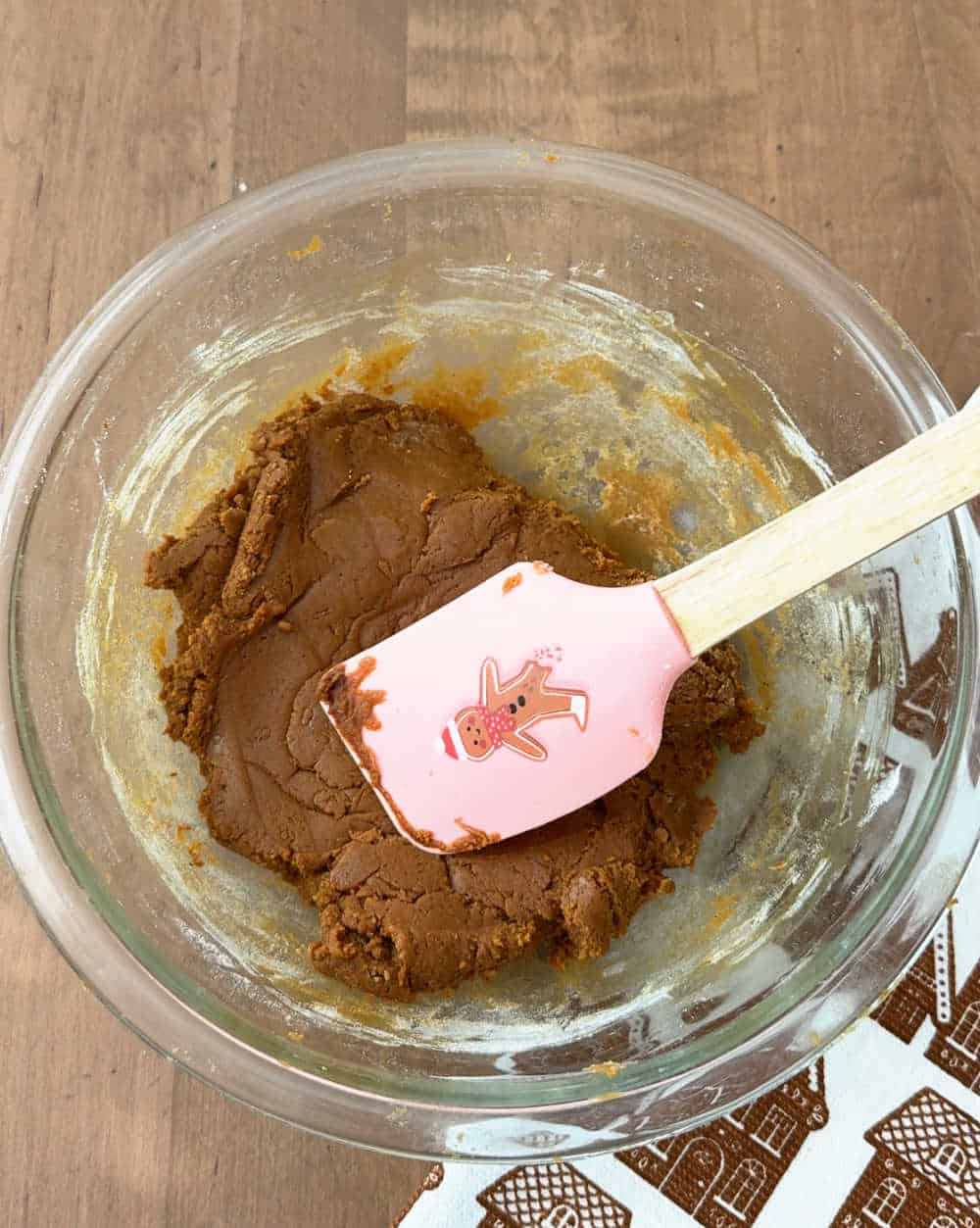 stirring dough with spatula.