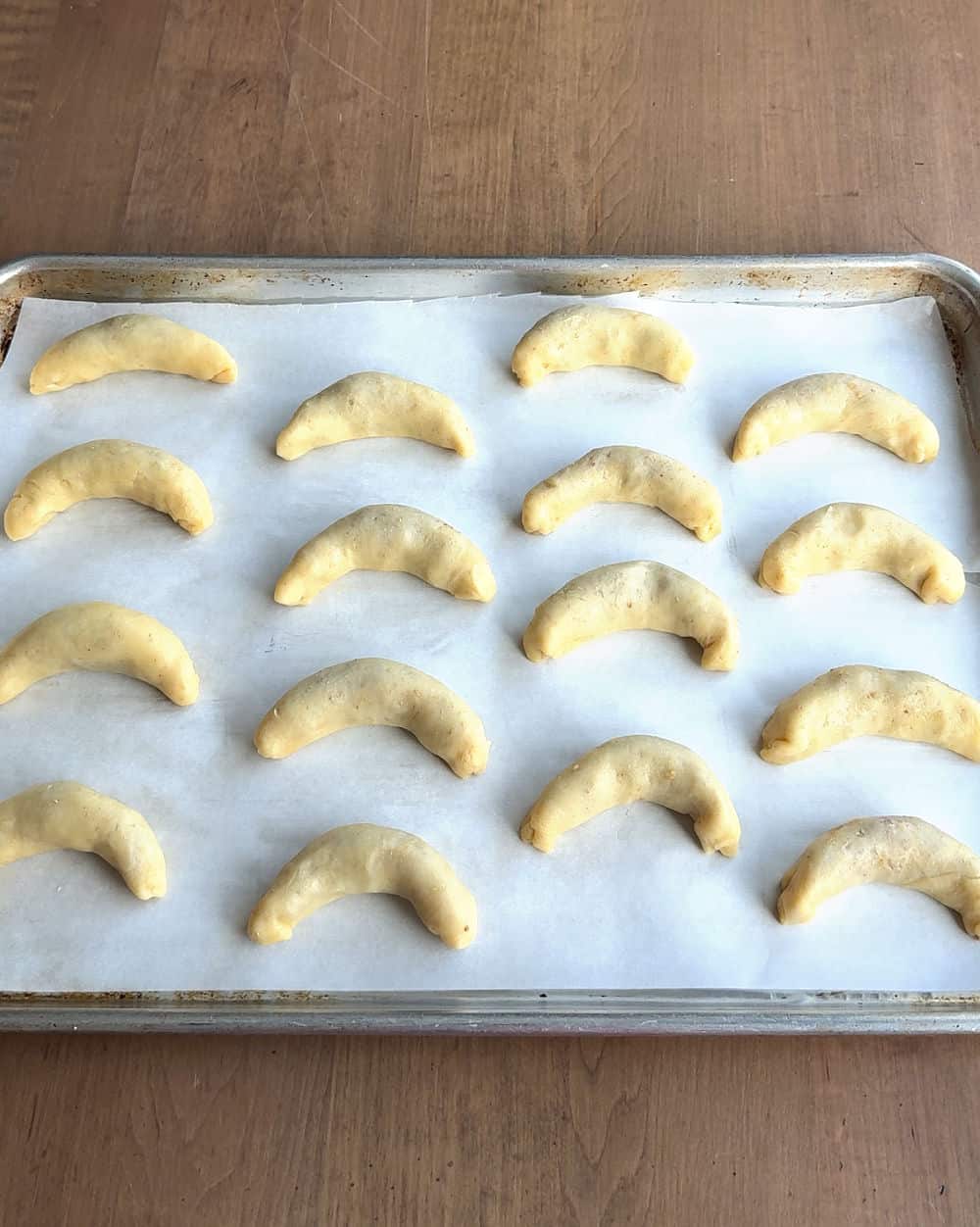 nut horn crescents on baking sheet.