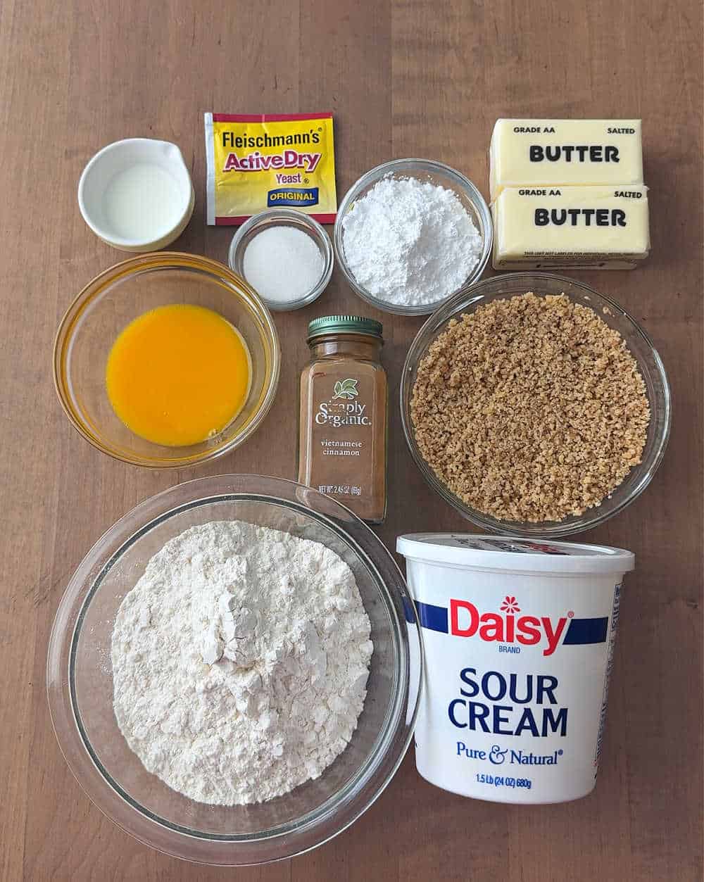 butter, flour, yeast, sugar, cinnamon, milk, sour cream, nuts, egg.