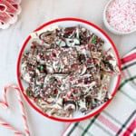 peppermint bark with candy canes and sprinkles.