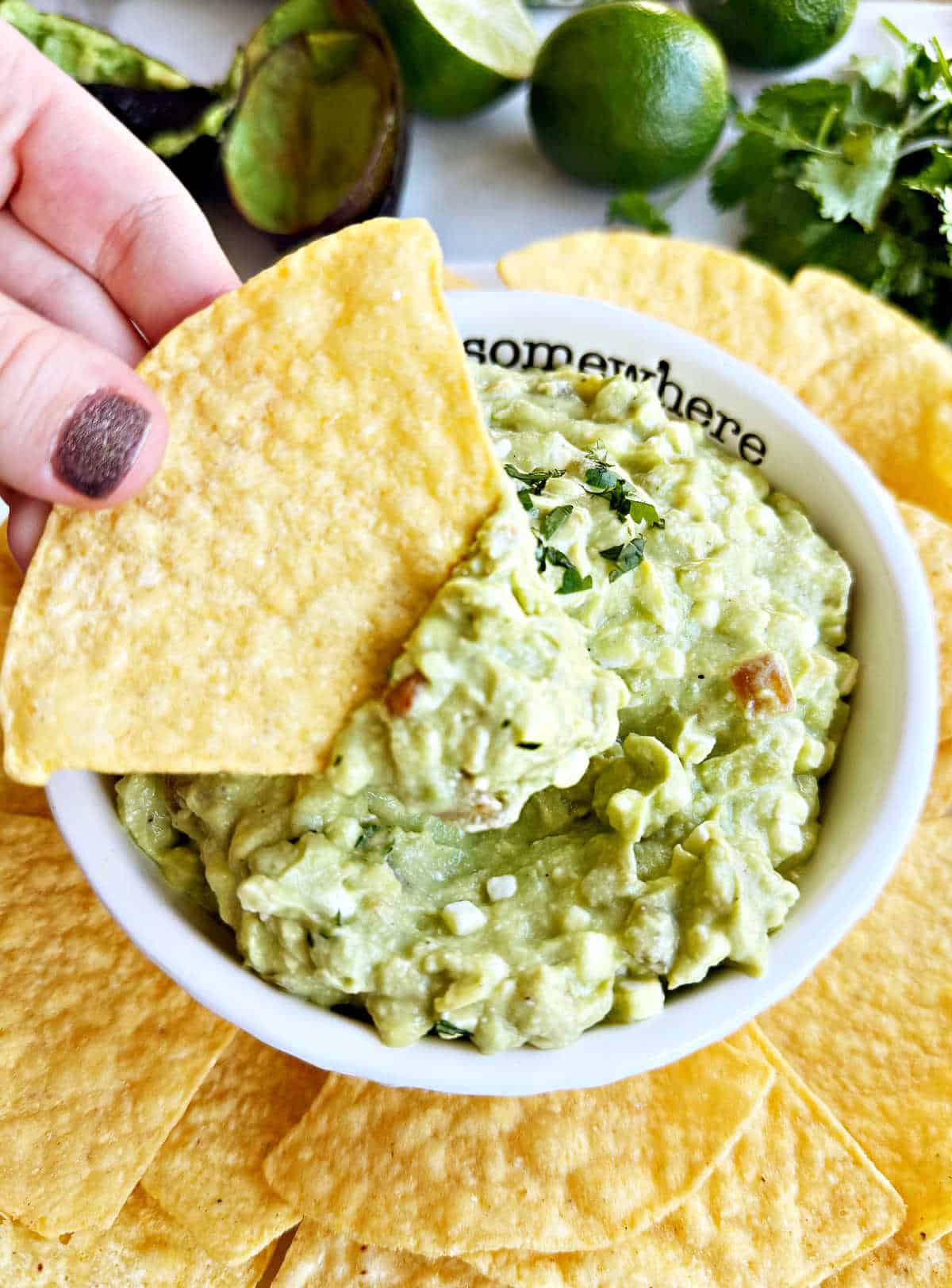 avocado cottage cheese dip on tortilla chip.