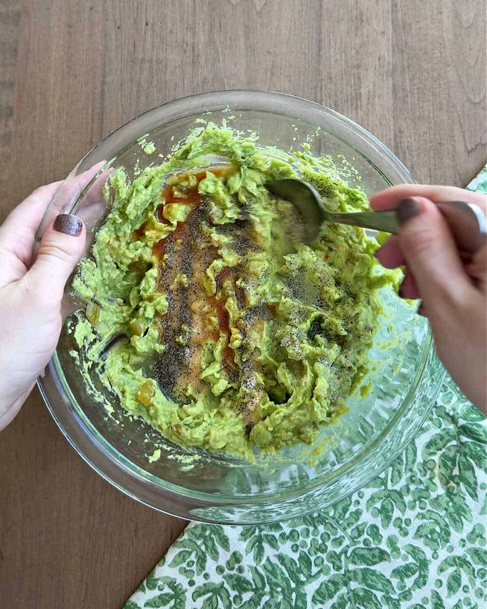 mixing spices into dip.