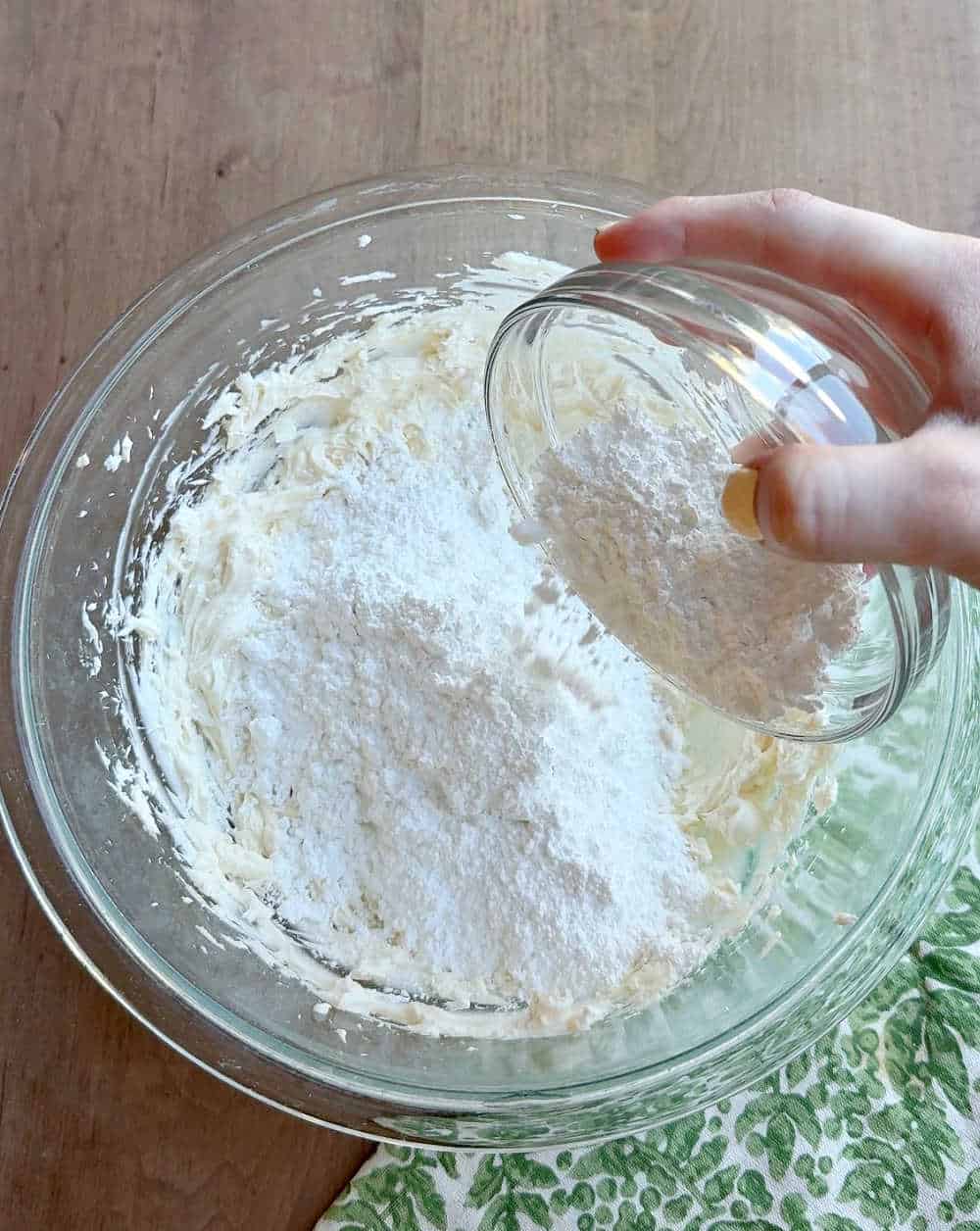 adding powdered sugar.