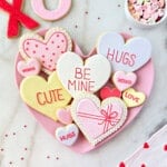 heart shaped Valentine cookies decorated with royal icing.