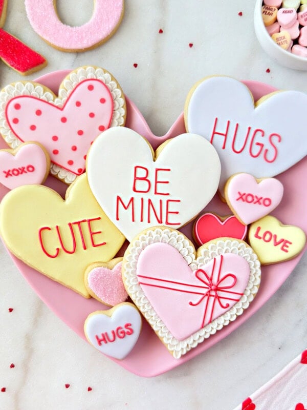 heart shaped Valentine cookies decorated with royal icing.