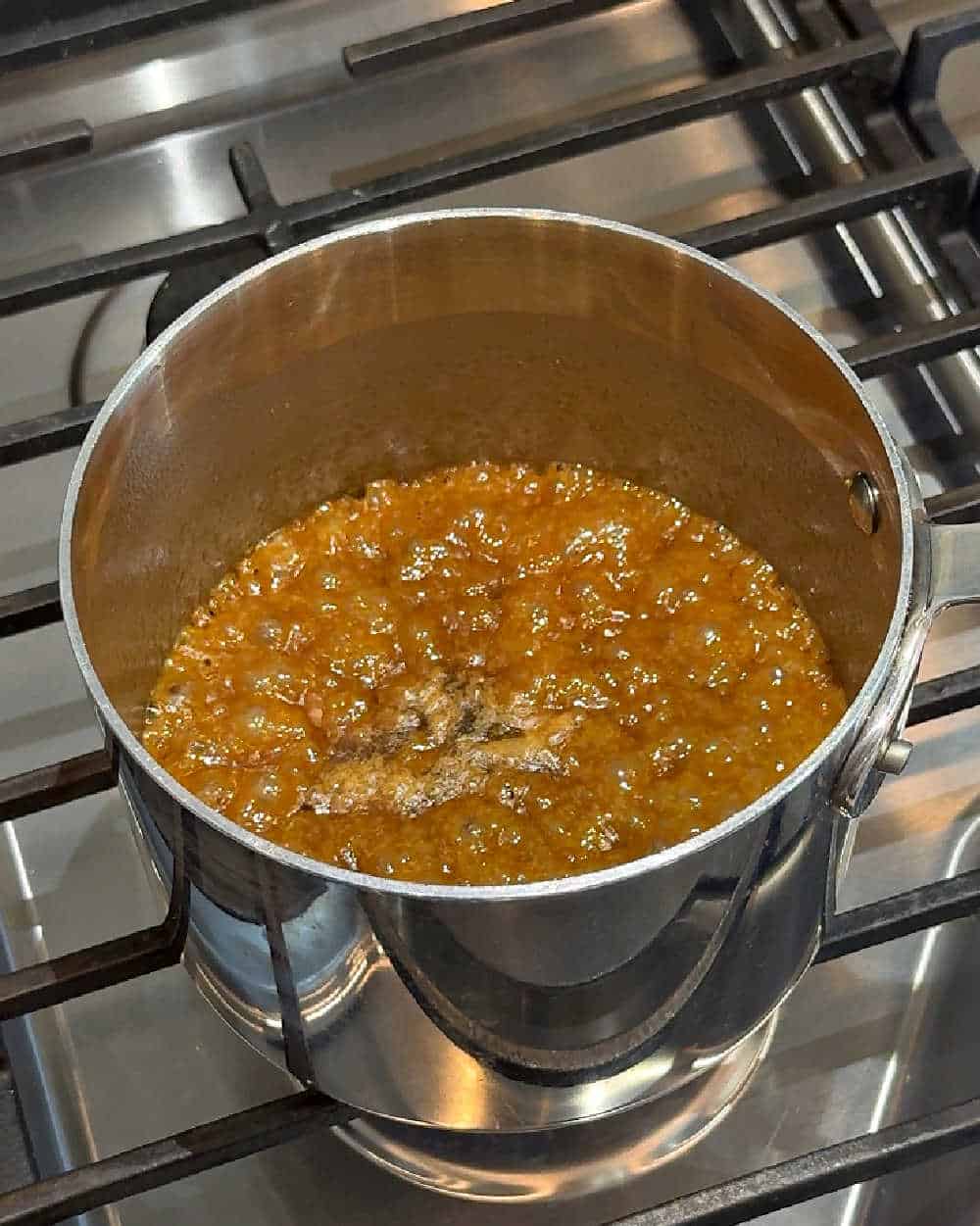 boiling butter brown sugar mixture on stove.