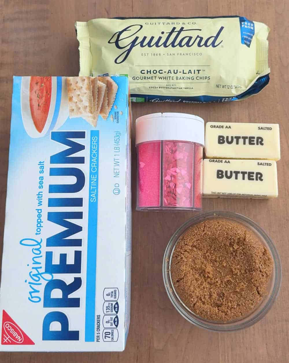 saltines, white chocolate, butter, brown sugar, sprinkles.