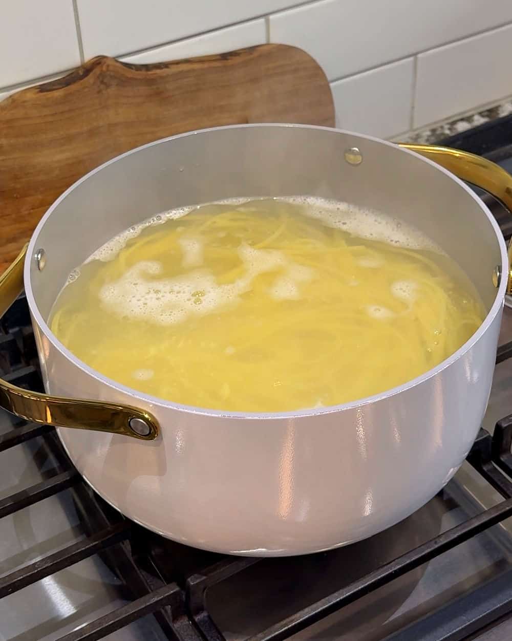 boiling pasta on stove.