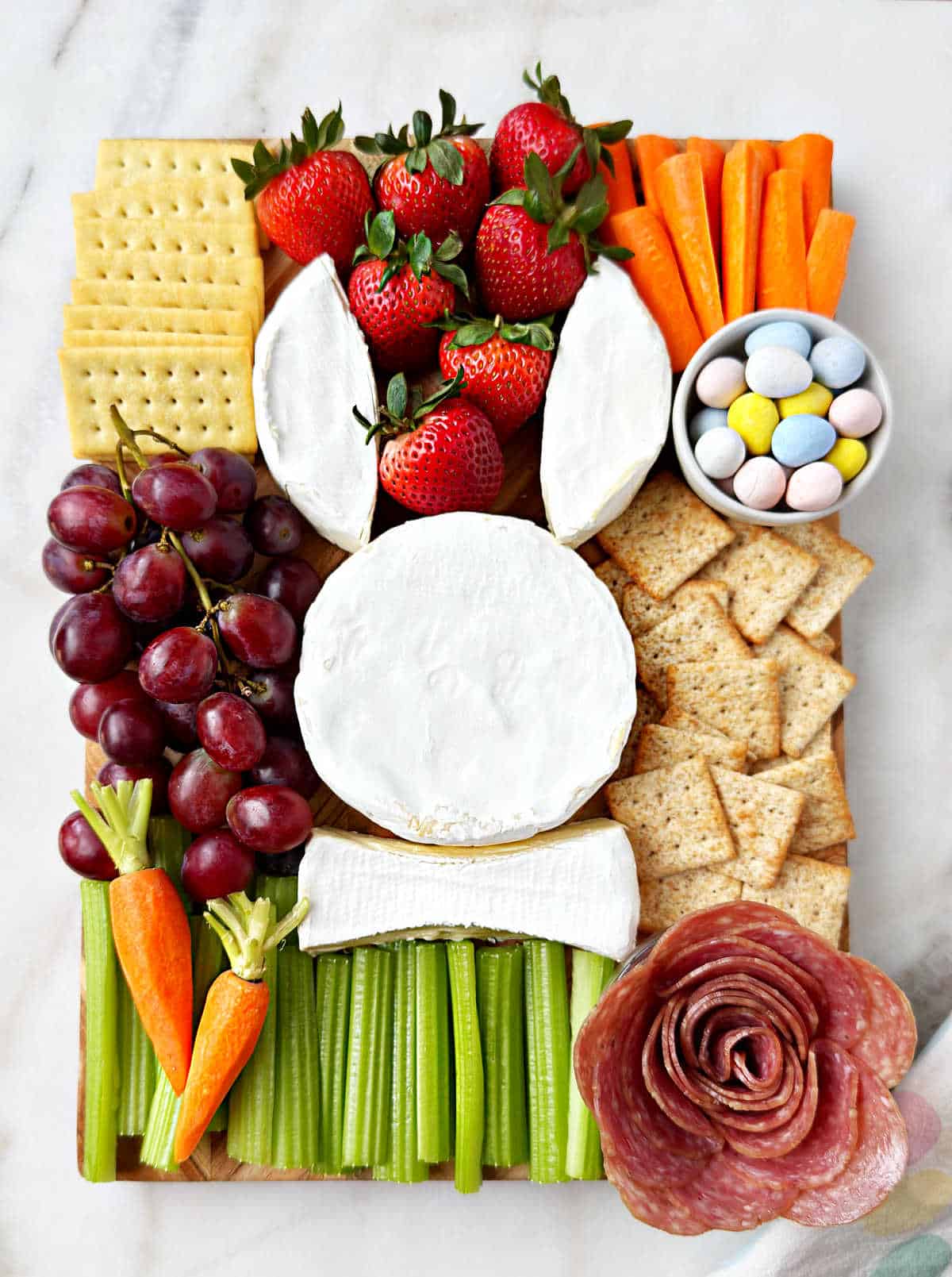 assemble all ingredients on the easter charcuterie board.