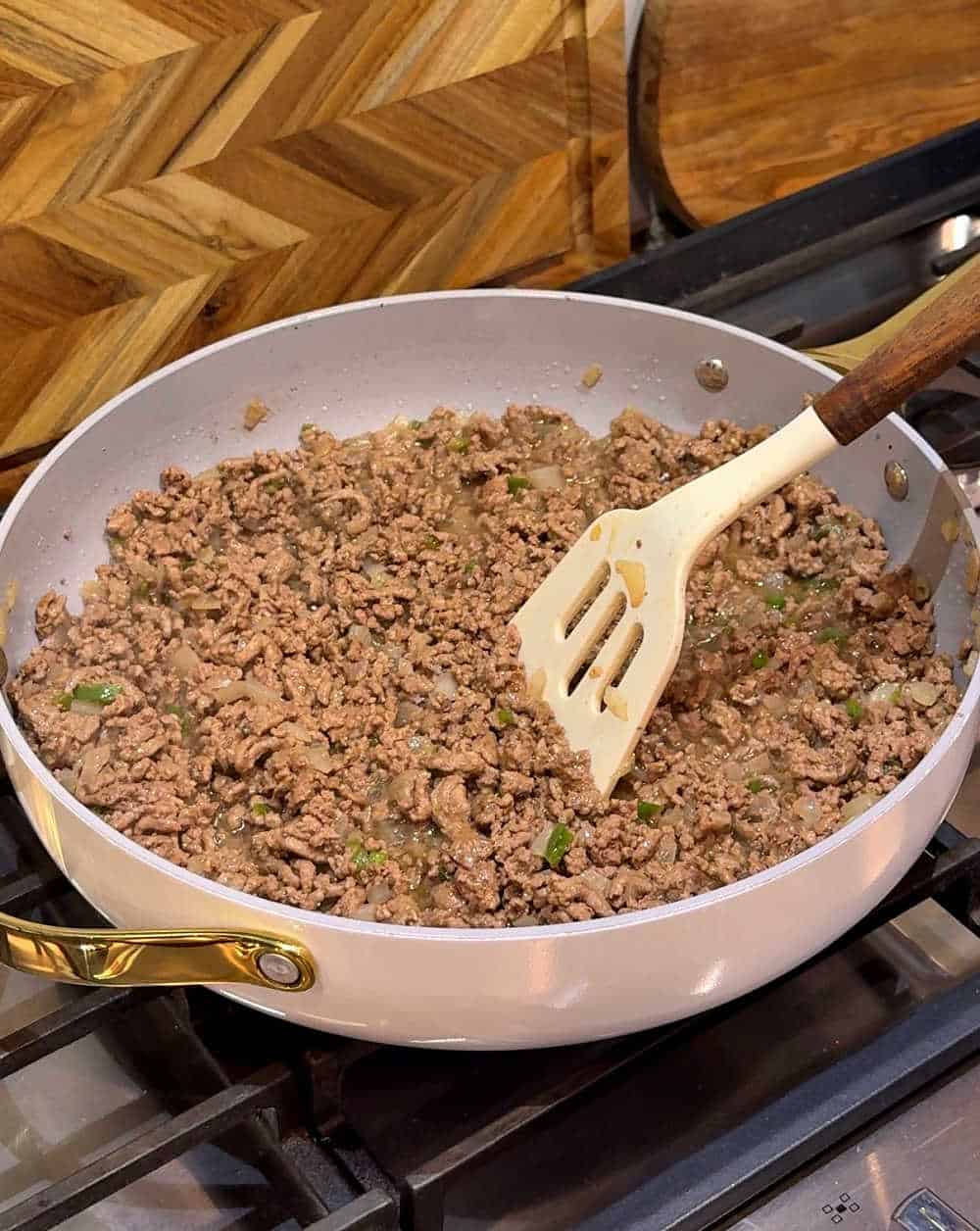 browning beef in skillet.