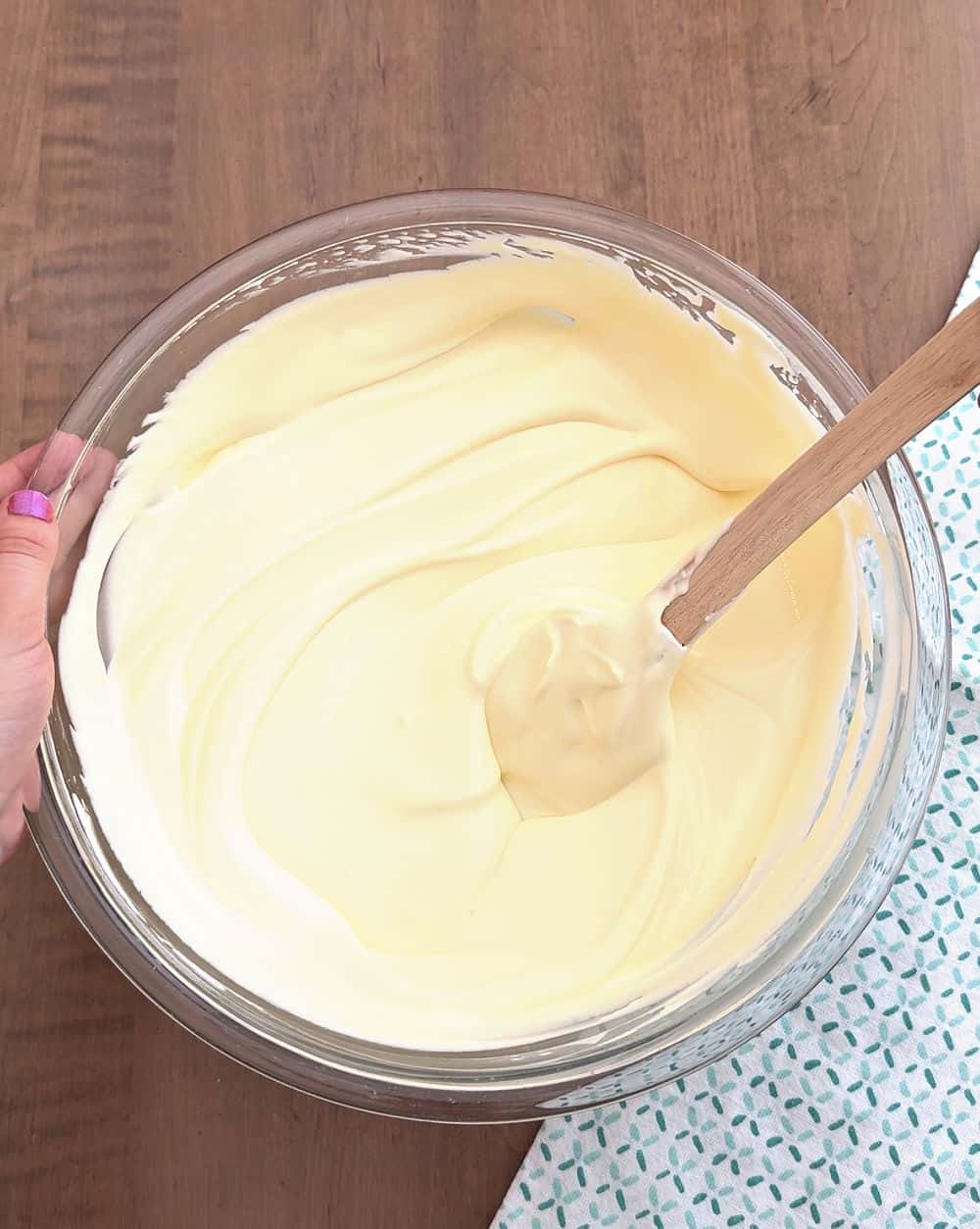 folding cool whip into pudding.