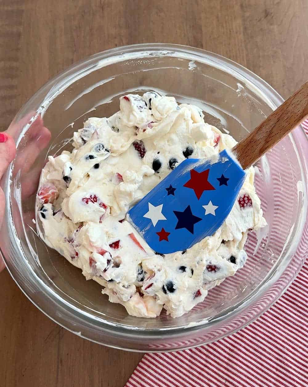 stirring ingredients with star spatula.