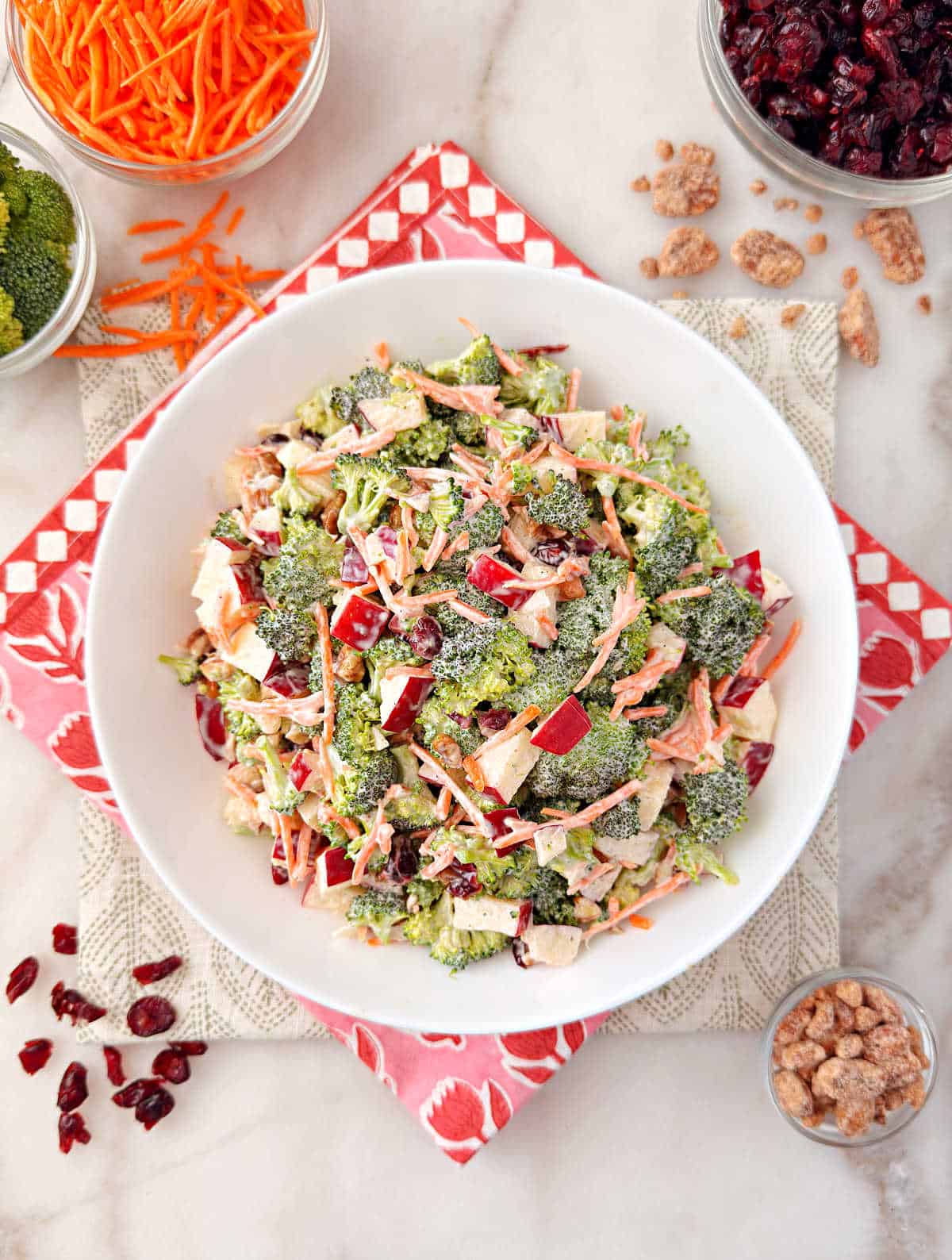 bowl of broccoli cranberry salad on the table.
