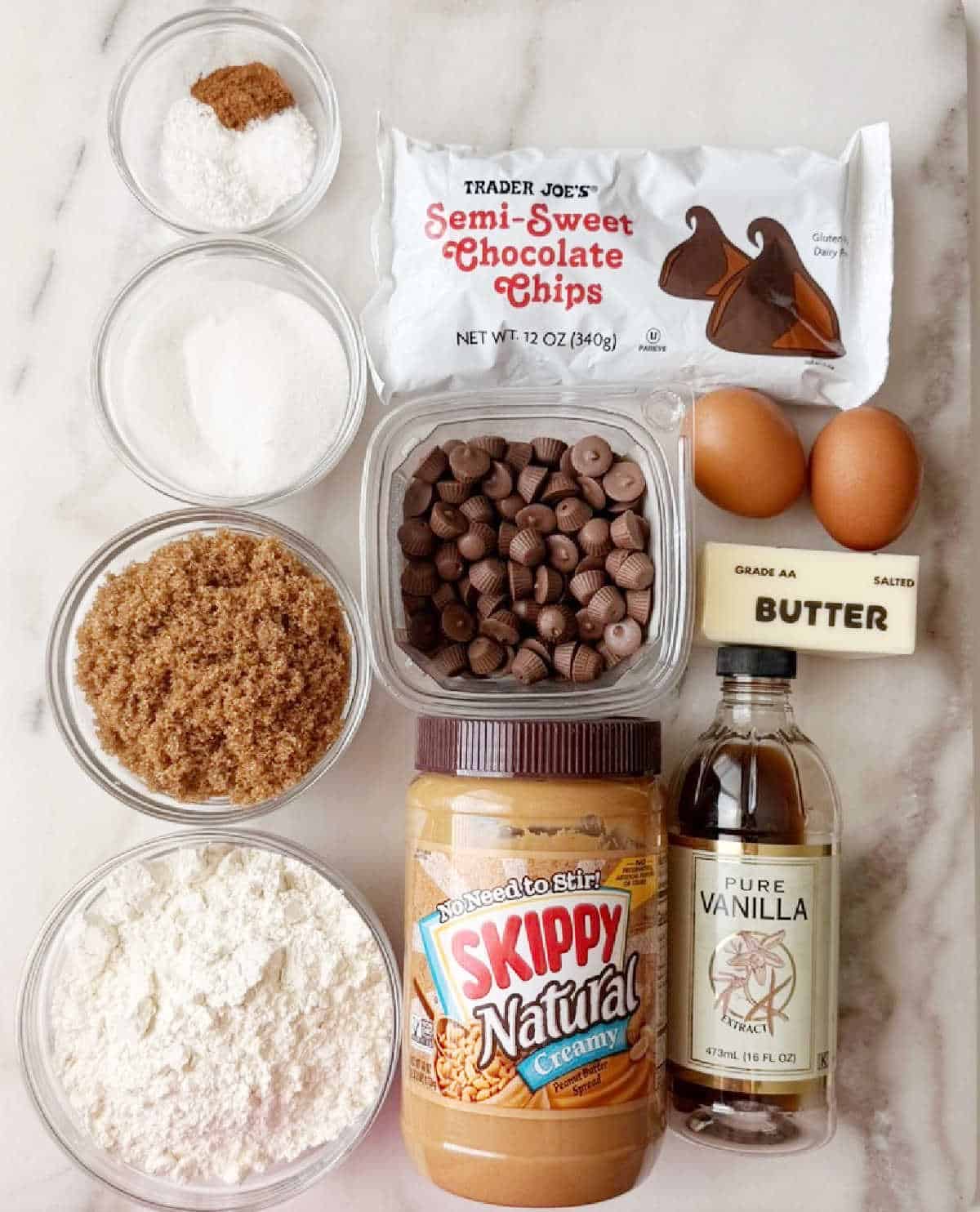 peanut butter, pb cups, chocolate chips and ingredients for cookie bars.