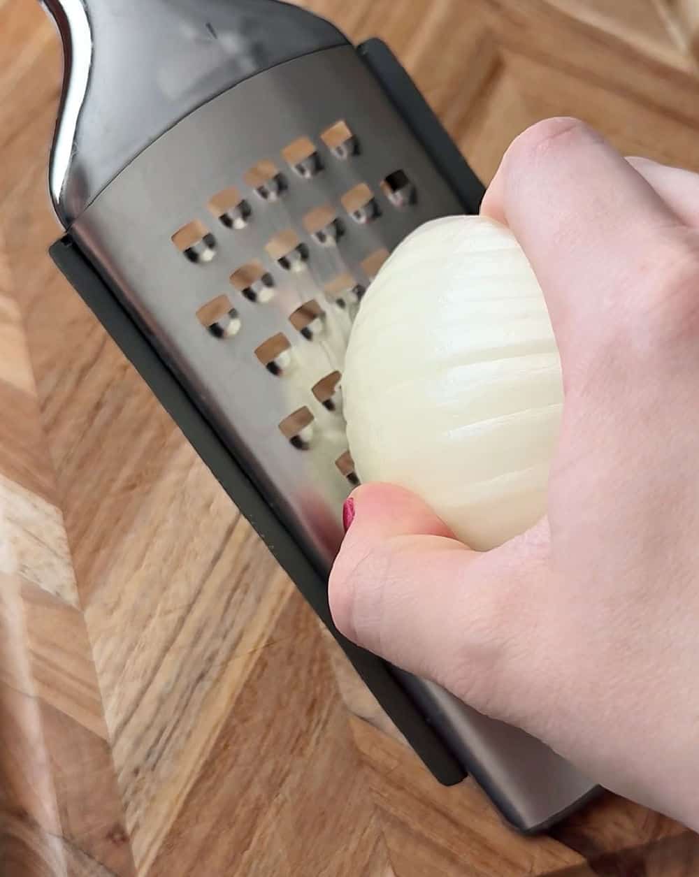 grating an onion.