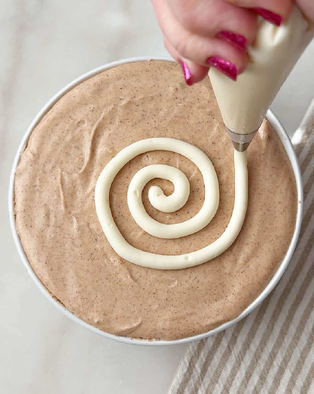 piping icing on top of dip.