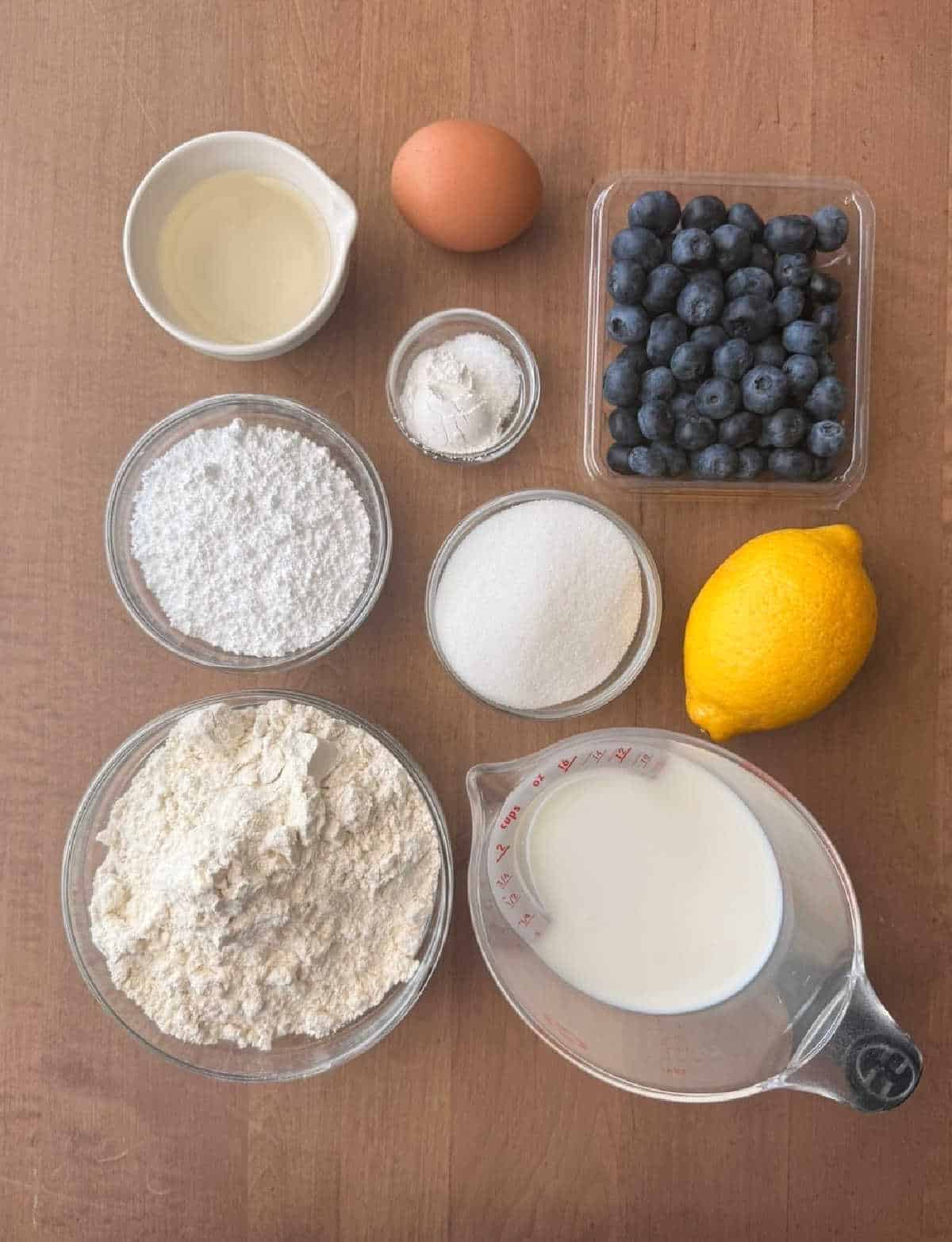 egg, four, sugar, blueberries, lemon, oil, baking powder and salt.