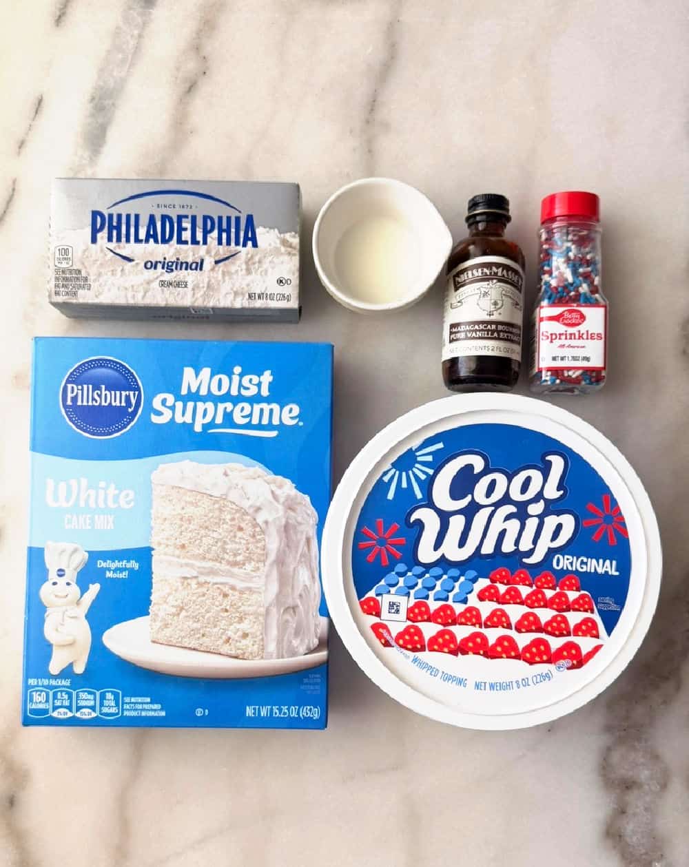 cake mix, cream cheese, milk, vanilla, sprinkles, cool whip.