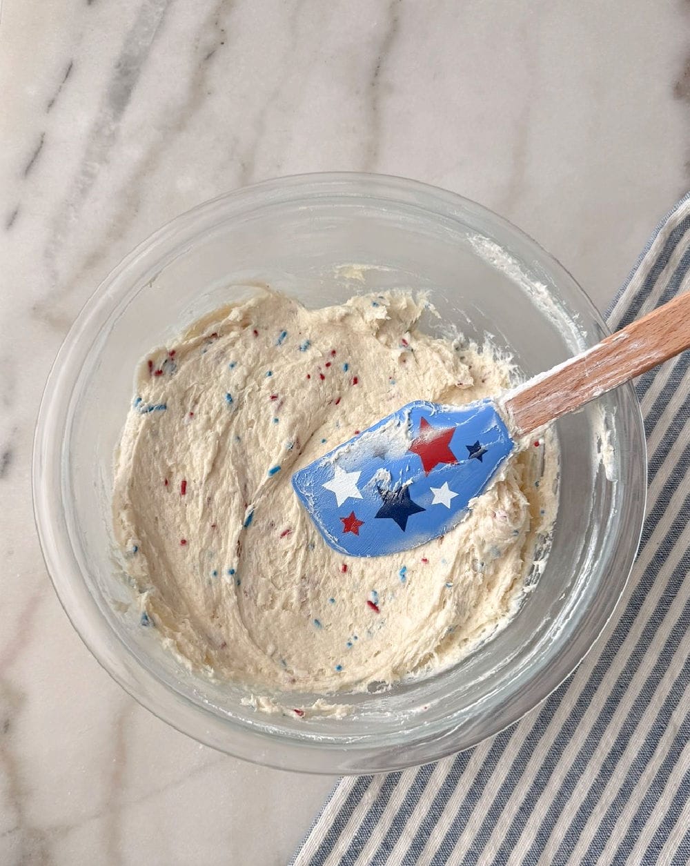 folding in sprinkles with star spatula.