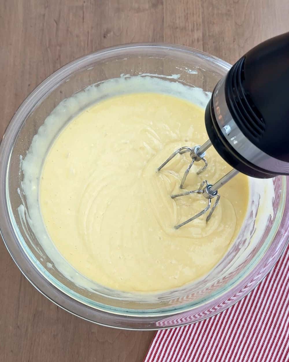 mixing cake batter in mixing bowl.