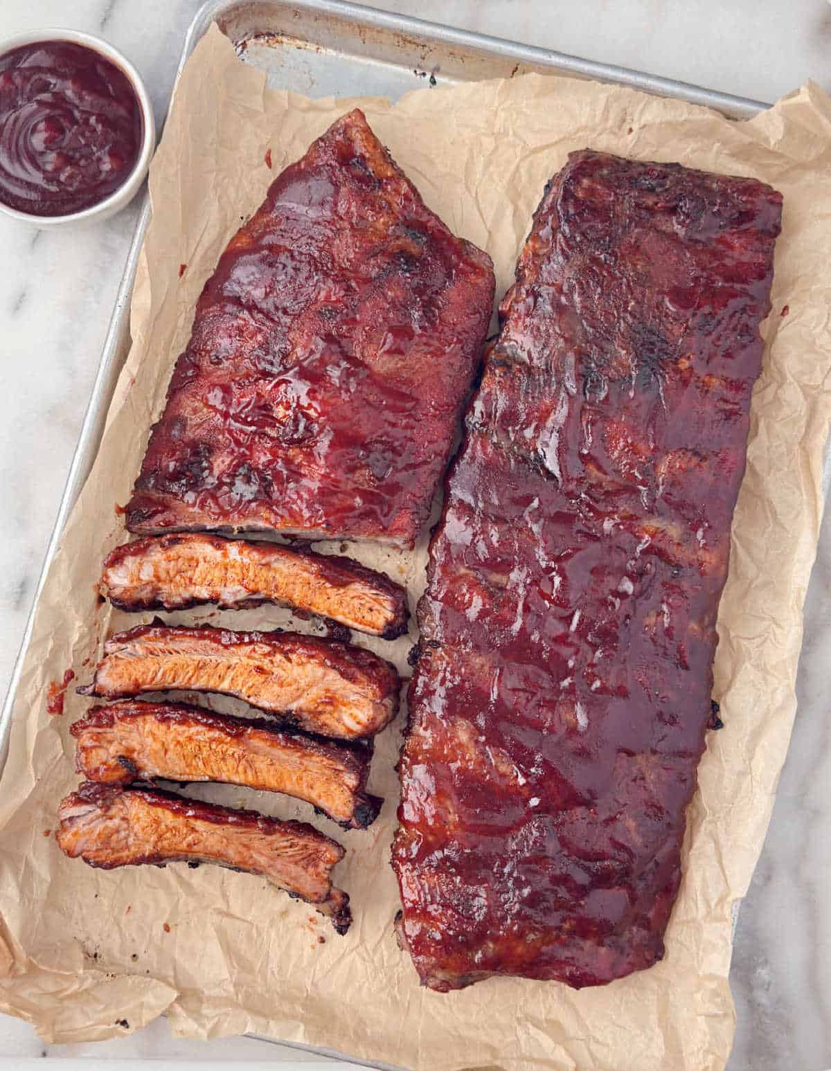 St Louis style pork ribs baked in oven with barbecue sauce.