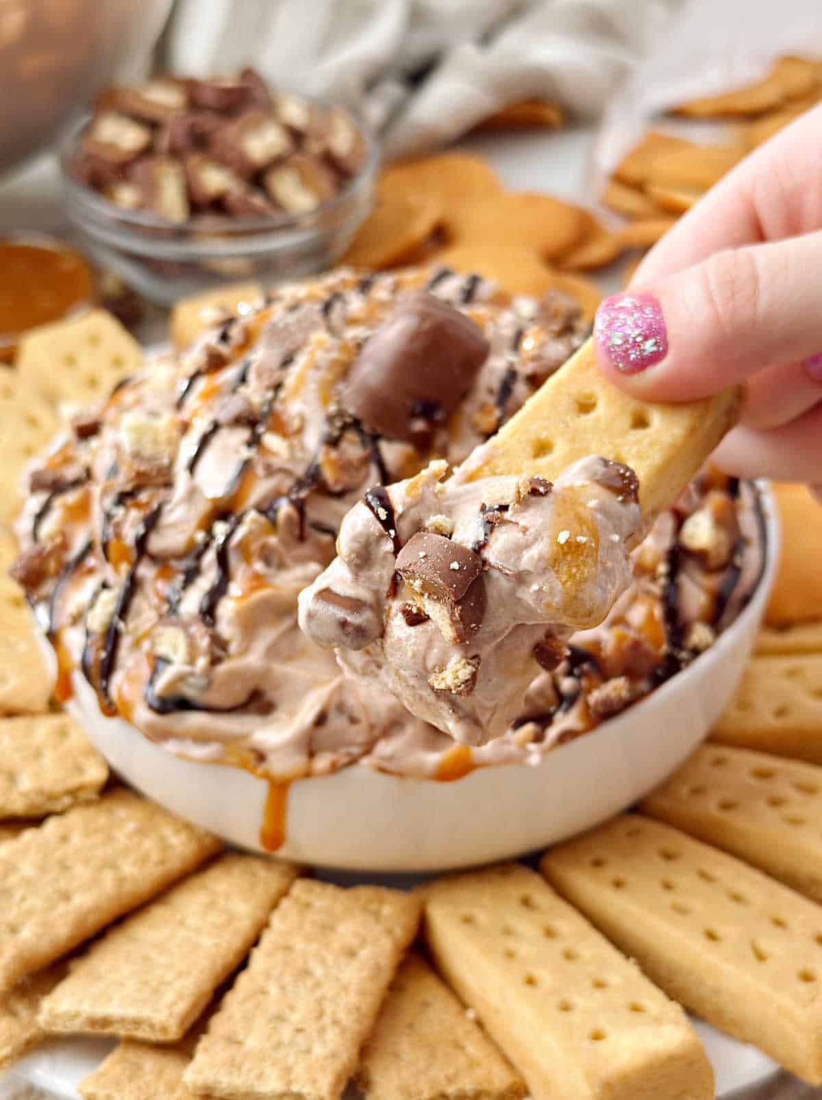 Twix dip on shortbread cookie.