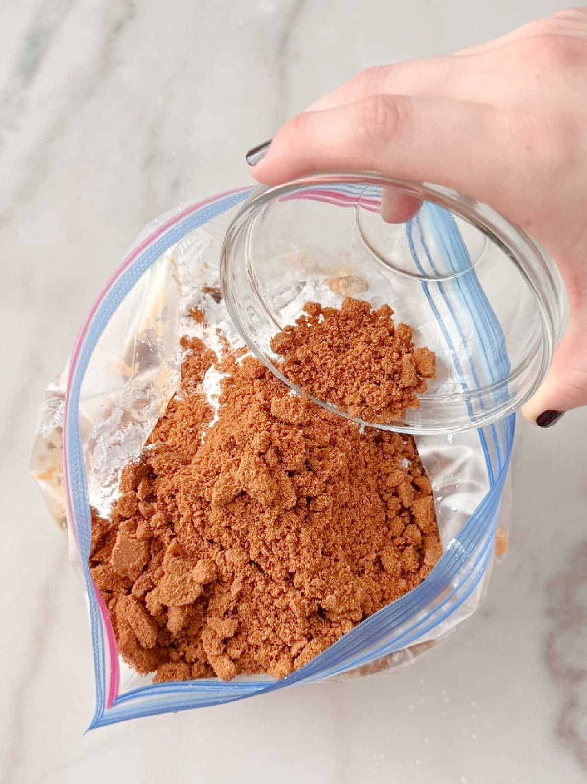 adding crushed cookies.