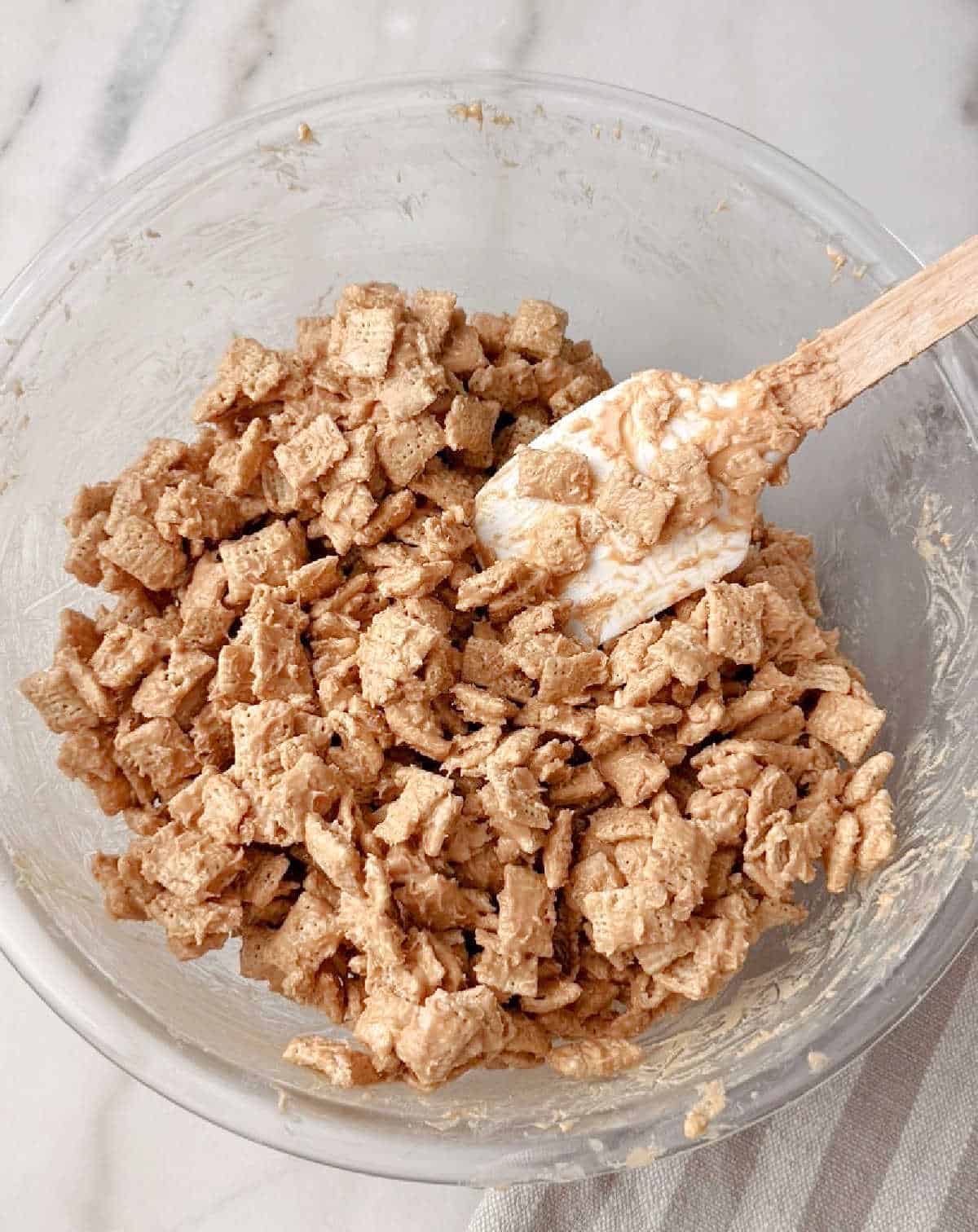 mixing in chex cereal.